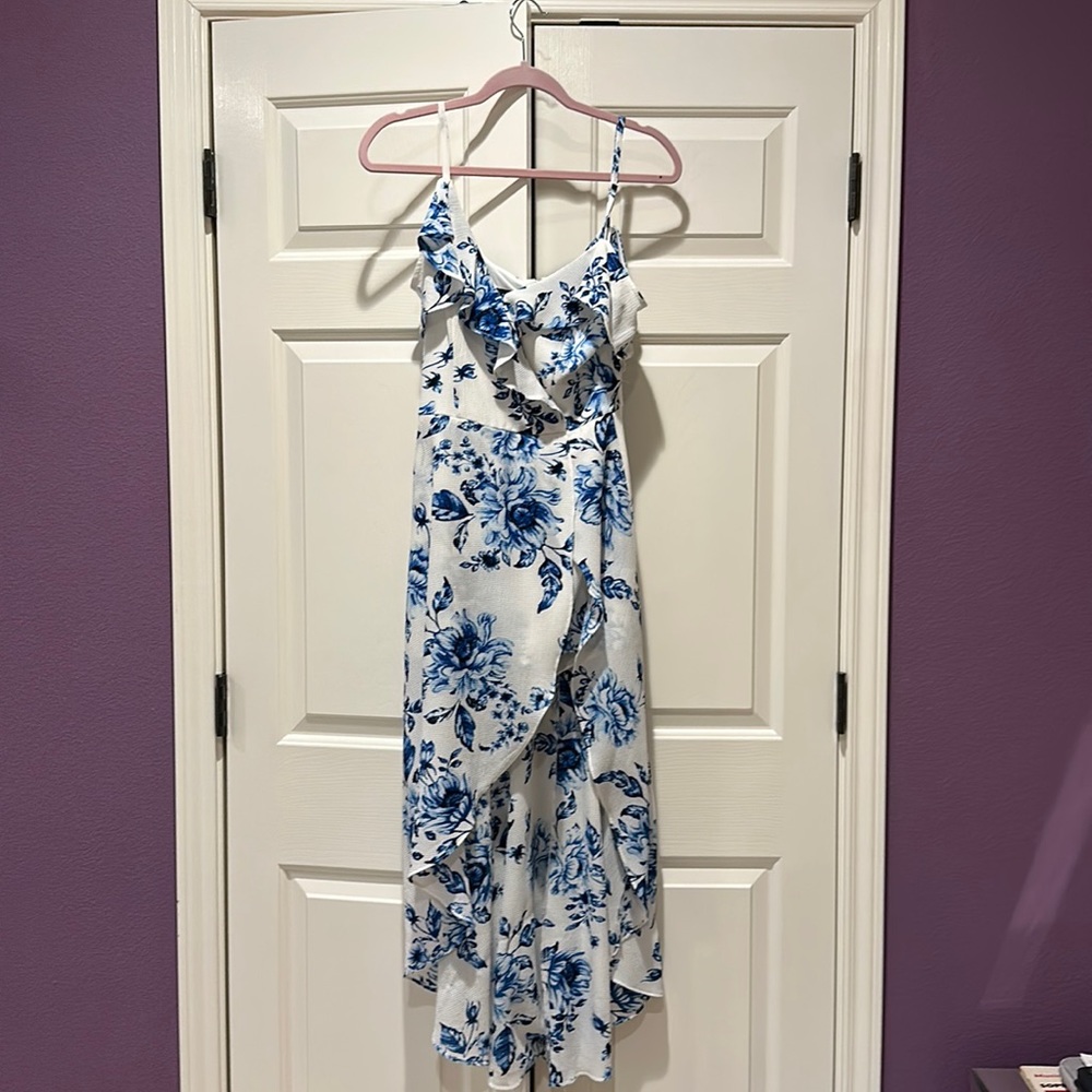 Blue flowered white romper with short to long dress.